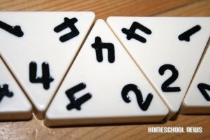Triominos, ein Spiel das die Mathematik fördert